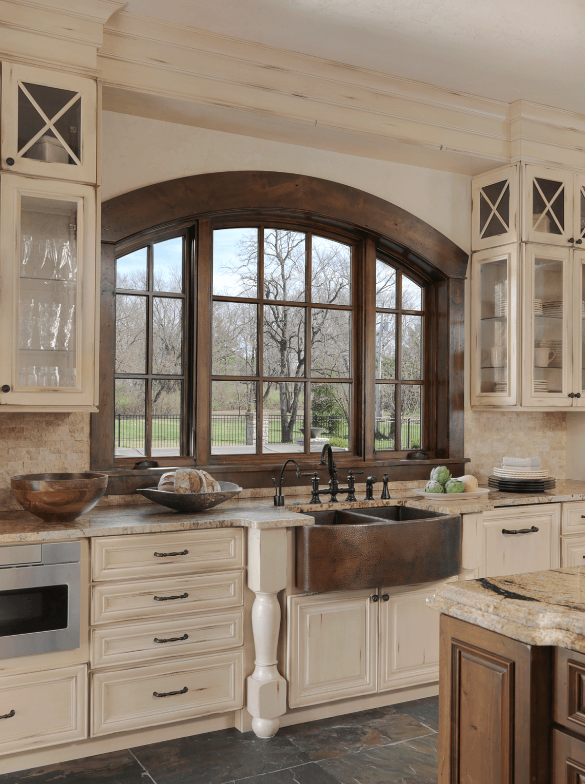 Distressed Kitchen Cabinetry and Copper Sink