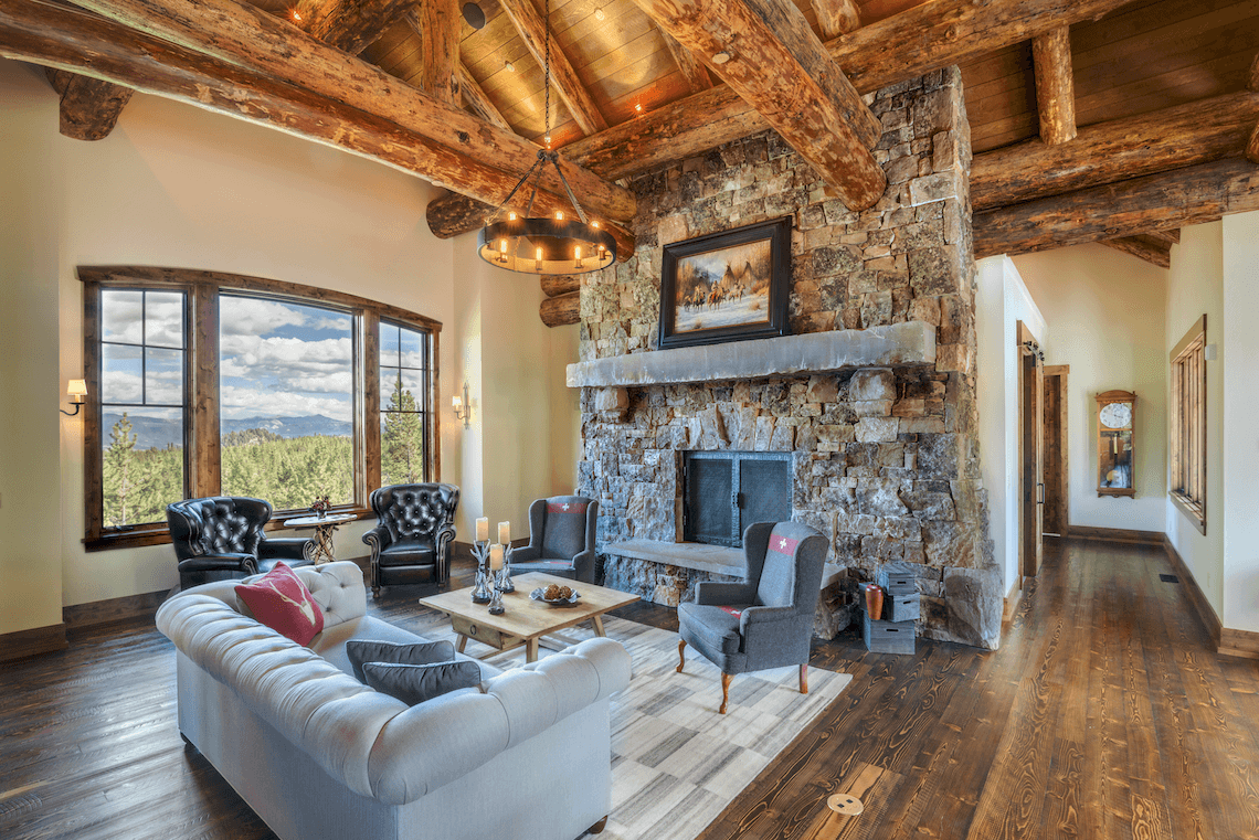 Rustic Family Room - Wood Beams and Stone Fireplace