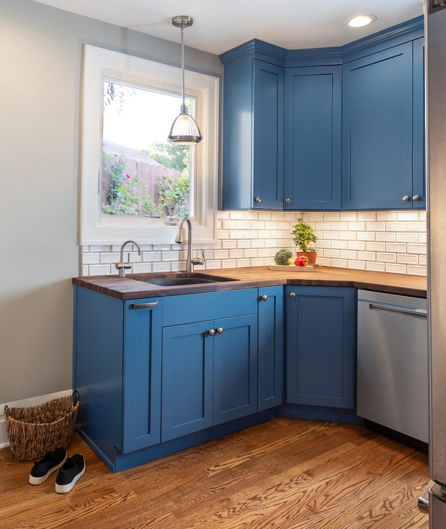 Blue kitchen cabinets in a bungalo renovation