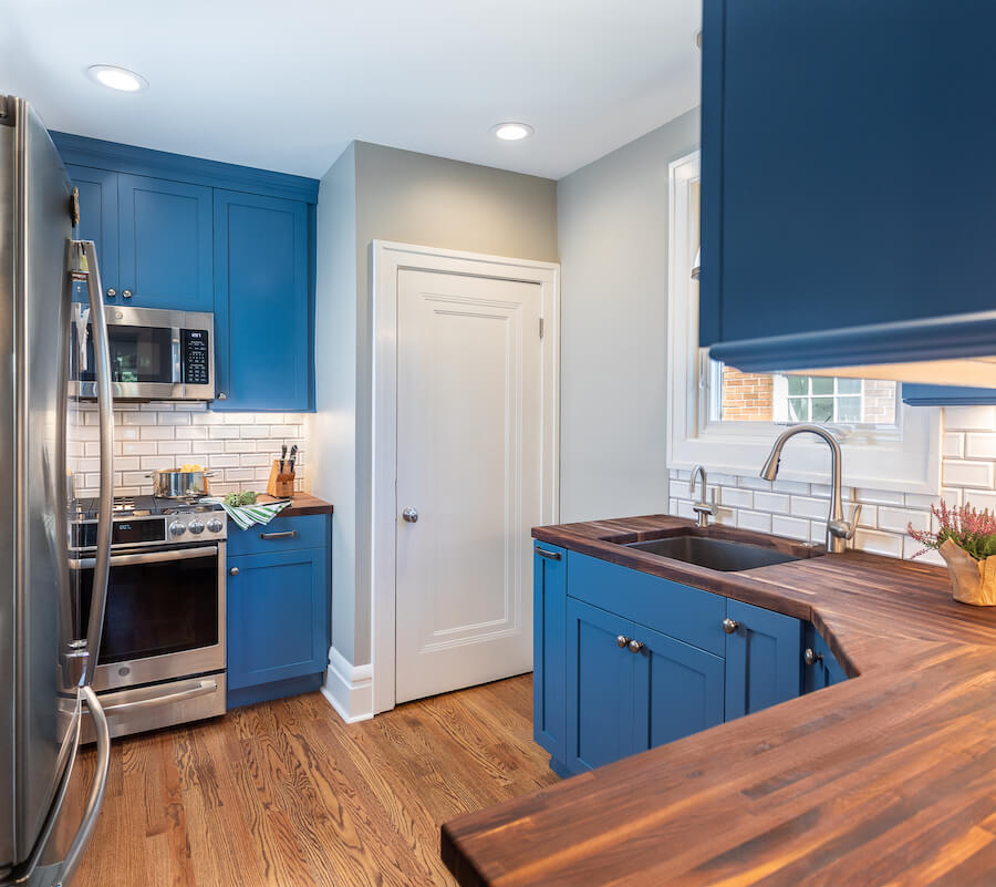 Custom colored blue cabinets in a bungalow renovation